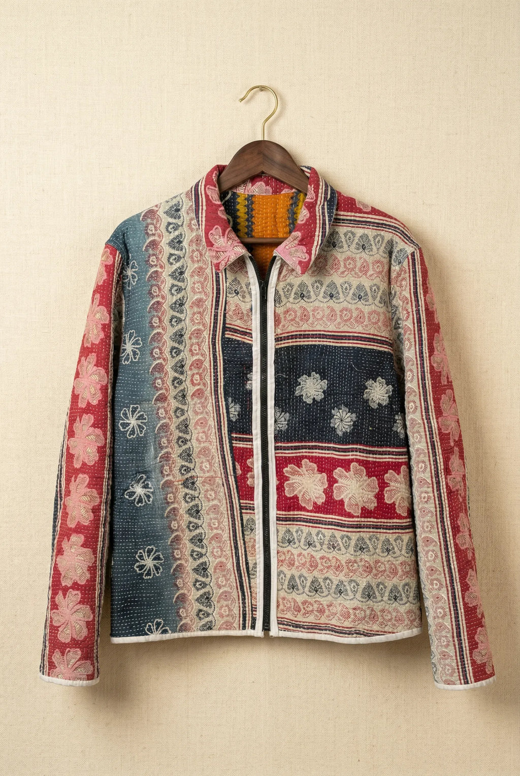 Kazi kantha jacket — reverse side, intricate kantha stitching on upcycled vintage fabric, hanger