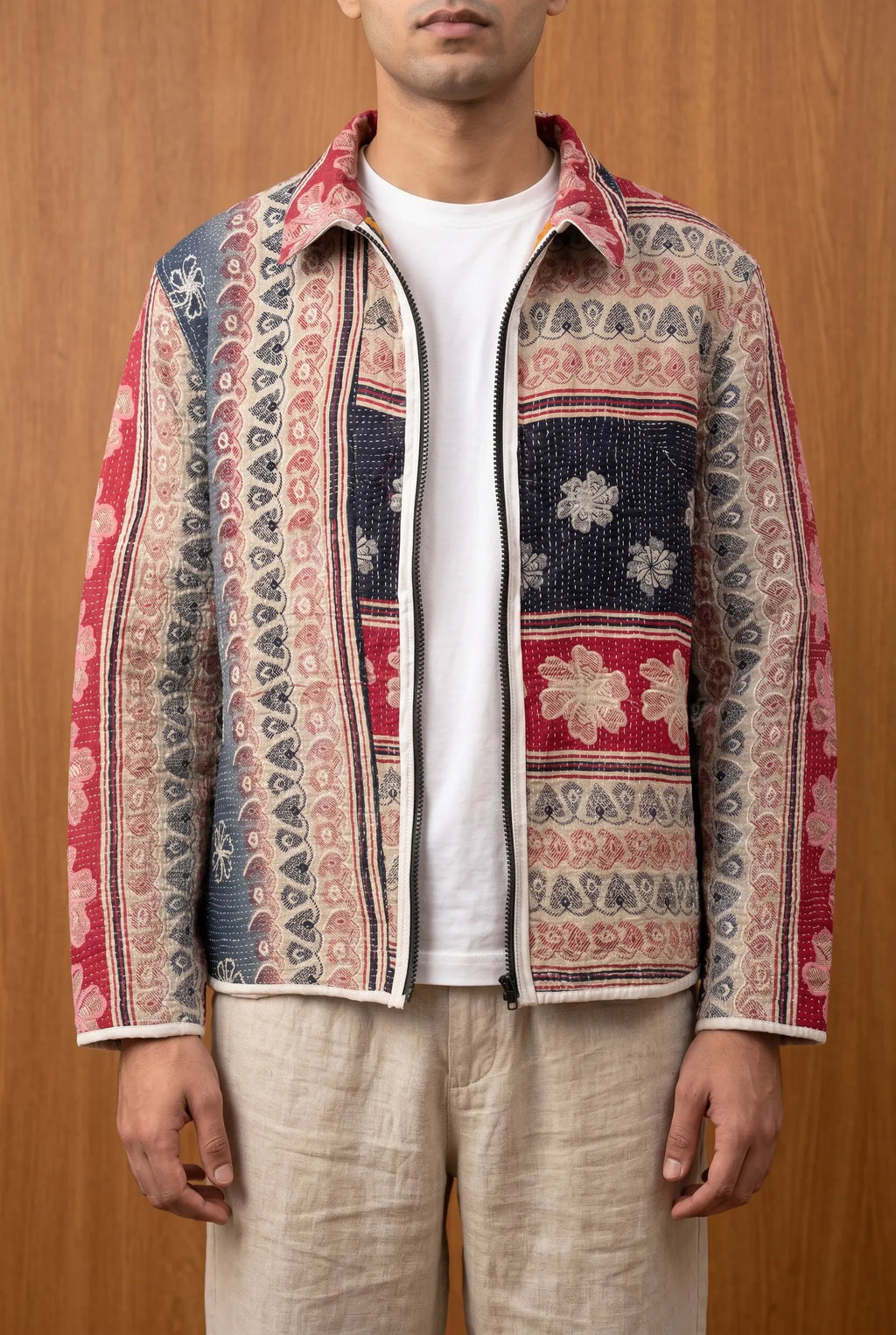 Model wearing Kazi kantha jacket open — densely hand-embroidered upcycled Indian outerwear
