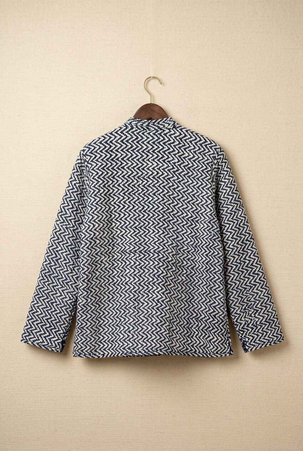 Chhipa reversible jacket — back of zigzag block-print reverse side on hanger