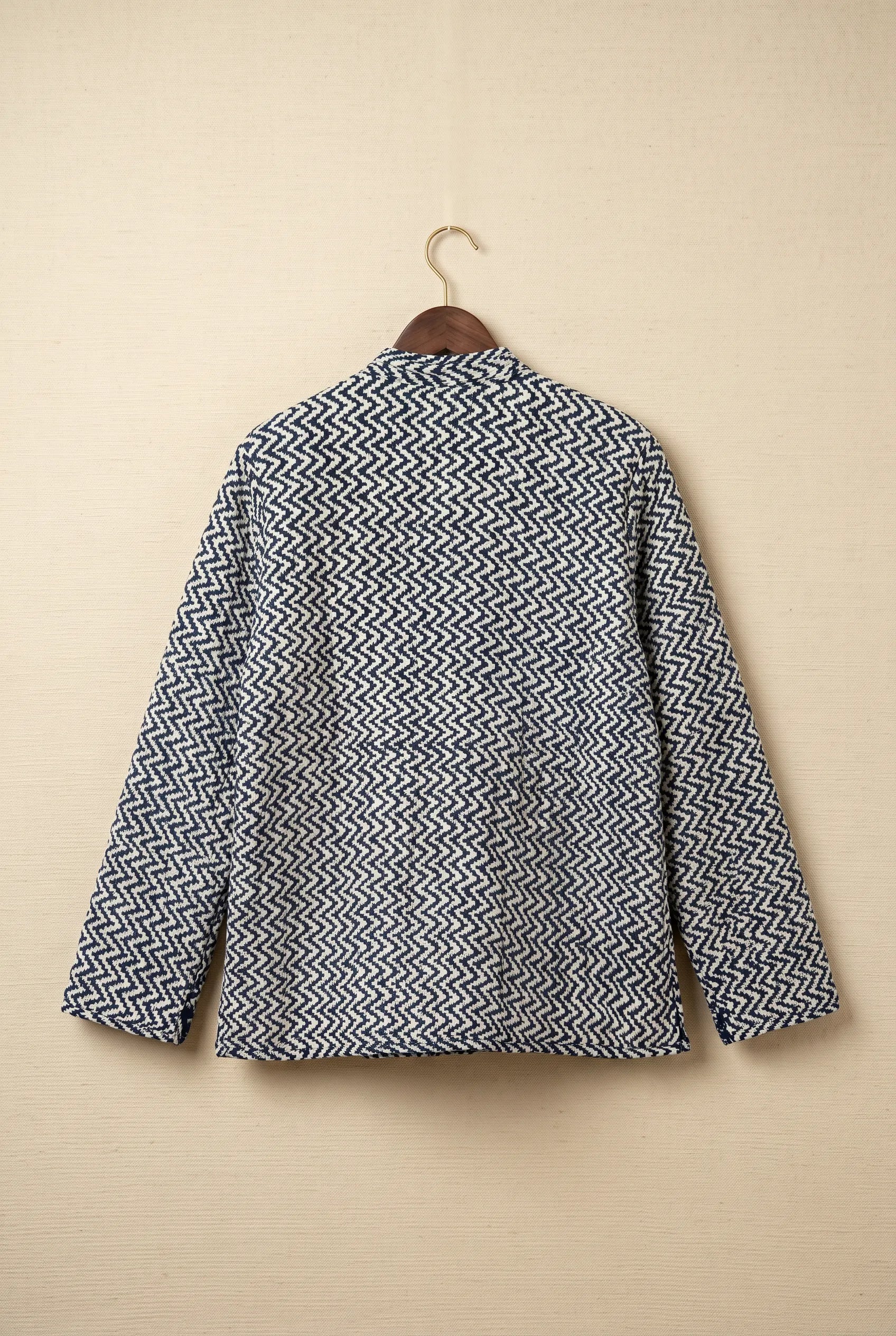 Chhipa reversible jacket — back of zigzag block-print reverse side on hanger