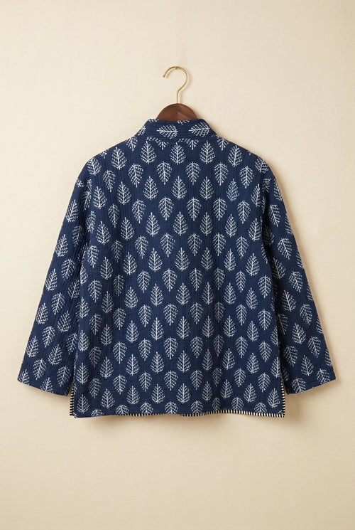 Chhipa quilted jacket — back view showing hand block-printed leaf pattern on Indian cotton